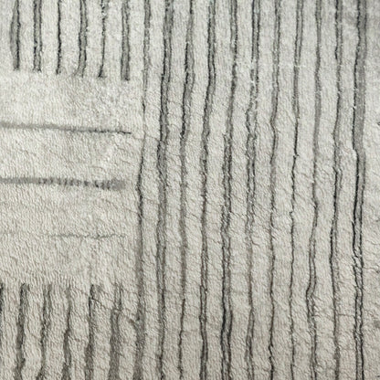 Jabeza Soft Contemporary Printed Rug 160x230cm features an abstract sketch design with a soft 12mm pile, ideal for modern interiors. Enhanced with durable polyester and anti-slip backing for stability and comfort.