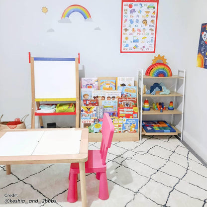 Melody Black and White Modern Floor Rug 200 x 300cm under a child's play corner, featuring a low wooden table, pink chair, and toys, enhances the inviting learning space with its abstract grid design.