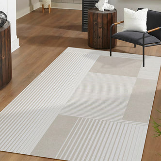 Nicho 160x230cm Polyester Tufted Modern Abstract Indoor Rug with a grid-like pattern of textured and striped panels, displayed in a modern setting with light wood flooring and minimalist furniture.