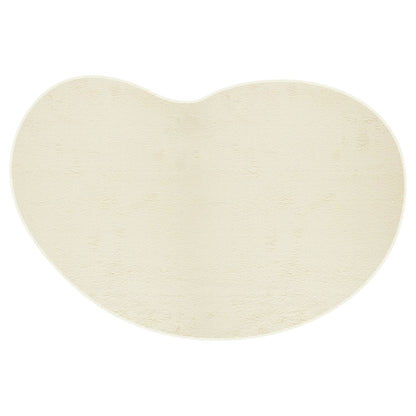 Parna 200x300cm Curved Large Shag Rug in Beige with a plush, U-shaped design, fitting snugly around the toilet base, ideal for adding softness and comfort to the bathroom floor.