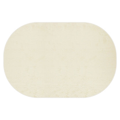Pavla 200 x 300cm Oval Shaggy Rug in Beige features a plush, soft oval design with a subtle heat-printed pattern, ideal for adding a cosy, inviting touch to any room.