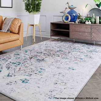 Close-up of Riana Distressed Faded Design Rug 160x230cm showcasing its intricate Persian-inspired medallion pattern with a distressed vintage look, highlighting its soft texture and suitability for high-traffic areas.