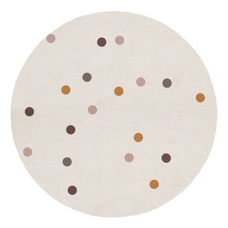 Roya 160x160cm Round Polka Dot Kids Indoor Rug features a cream surface adorned with playful, muted polka dots in browns, pinks, and ochres, enhancing any child's space with charm and warmth.
