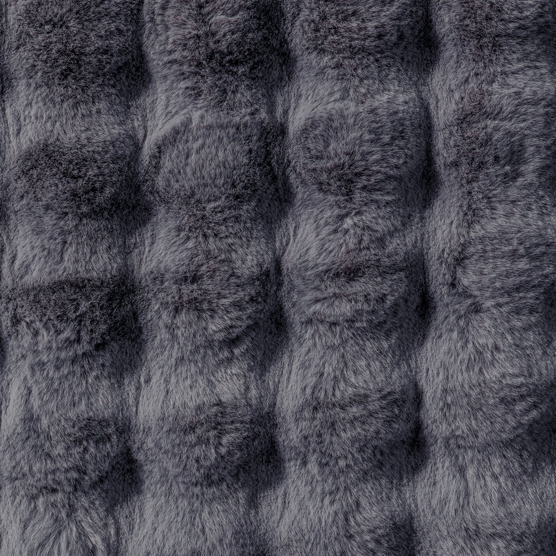Close-up of the Severa 180x300cm Fluffy Fur Textured Bubble Rug Grey, showcasing its plush, faux-fur texture with individual fibers visible, emphasizing the luxurious and cosy appearance.