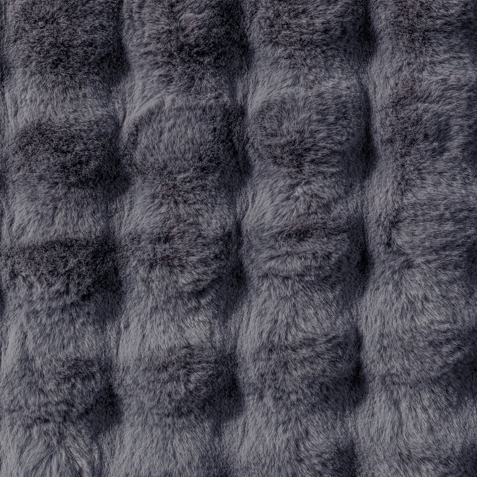 Close-up of the Severa 180x300cm Fluffy Fur Textured Bubble Rug Grey, showcasing its plush, faux-fur texture with individual fibers visible, emphasizing the luxurious and cosy appearance.
