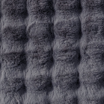 Close-up of the Severa 180x300cm Fluffy Fur Textured Bubble Rug Grey, showcasing its plush, faux-fur texture with individual fibers visible, emphasizing the luxurious and cosy appearance.