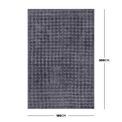 Severa 180x300cm Fluffy Fur Textured Bubble Rug Grey, featuring a rectangular dark-gray waffle-textured design, displayed flat with dimension lines indicating 180 cm width and 300 cm height against a white background.