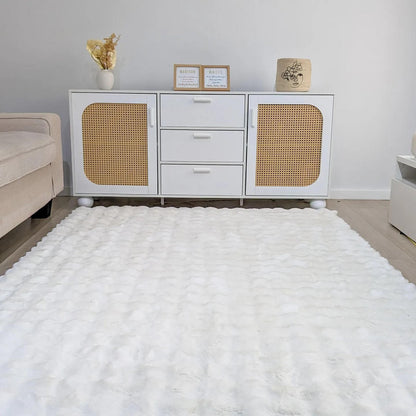 Severa 180x300cm Fluffy Textured Bubble Rug in White, featuring a plush, undulating texture, positioned prominently on the living room floor, enhancing the modern and airy decor.