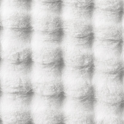 Severa 180x300cm Fluffy Textured Bubble Rug in White, showcasing a close-up of its soft, quilted faux-fur surface arranged in a subtle grid pattern, highlighting its luxurious and cozy texture.
