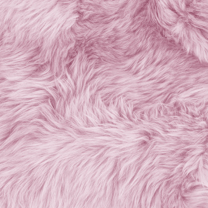 Close-up of the Shaddi Round Shaggy Soft Fluffy Fur Rug in Pink, showcasing its plush, long, silky fibers that emulate a luxurious sheepskin texture.