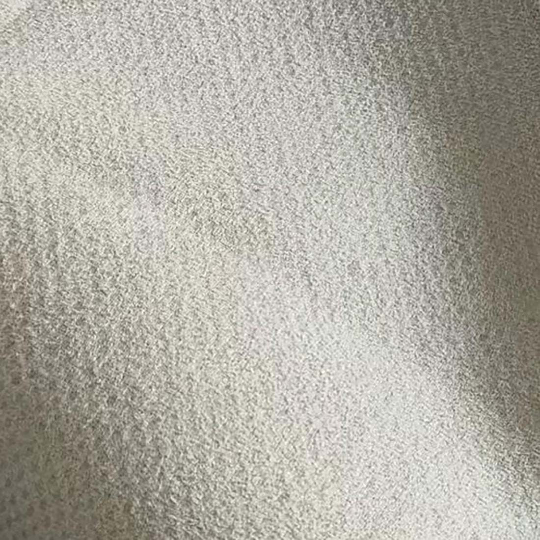 Close-up of Shaddi 120cm Round Shaggy Soft Fluffy Fur Rug in White, showcasing its uniform, textured surface resembling a soft, pebbled finish.