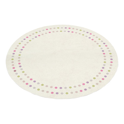 Shirin 160 Round Polka Dot Kids Indoor Rug features a cream background with pastel polka dots around the edge, adding a playful and cozy touch to children's spaces.