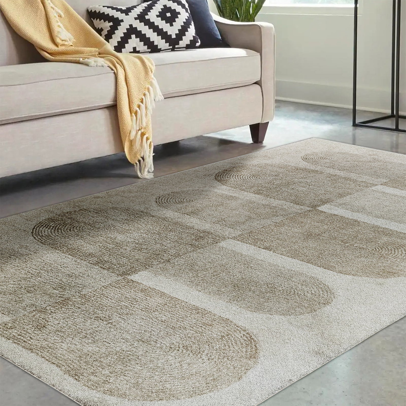 Tyche Soft Contemporary Printed Floor Rug 200 x 300cm showcased in a living room, highlighting its plush texture and intricate pattern, fitting seamlessly beneath a couch with a black and white pillow and yellow blanket.