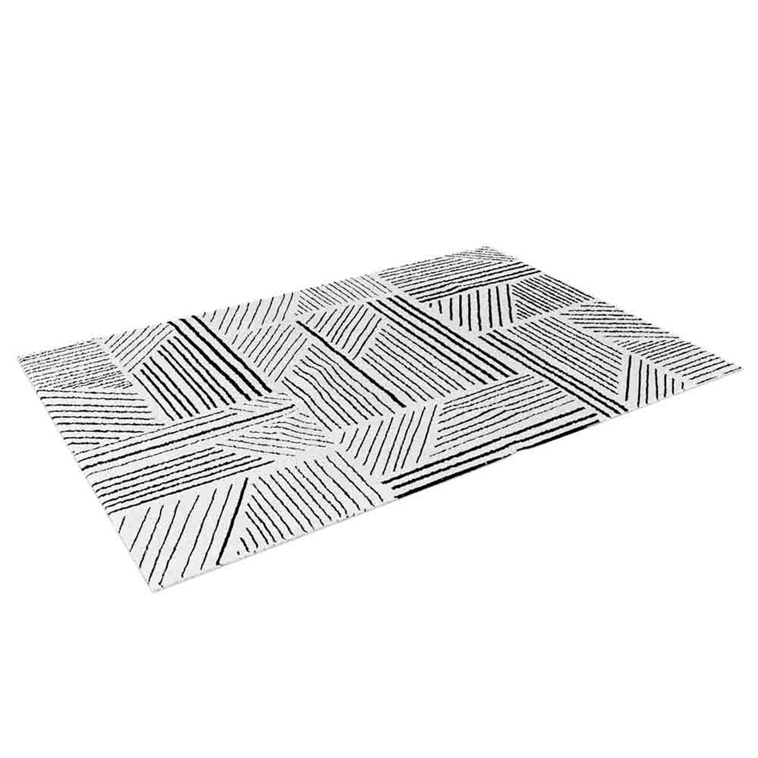 Vikki 200x300cm Large Abstract Contemporary Floor Rug featuring a geometric pattern of diagonal black and dark gray stripes over a white background, offering a modern, tribal-inspired aesthetic for versatile decor.