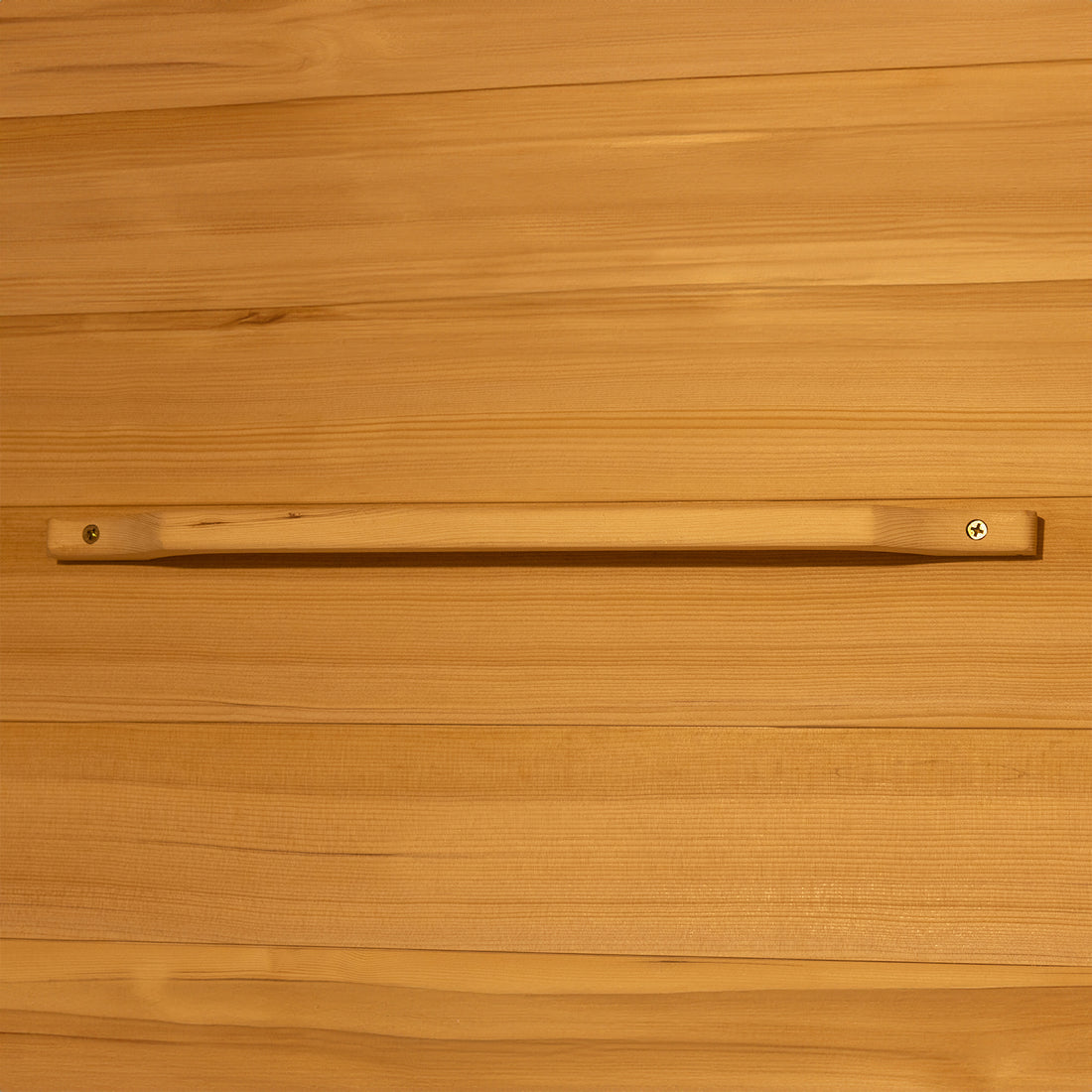 Harlow 1 Person Canadian Hemlock Infrared Home Sauna showing a wooden strip fastened with screws, emphasizing the sauna’s sturdy Canadian Hemlock construction and indoor installation suitability.