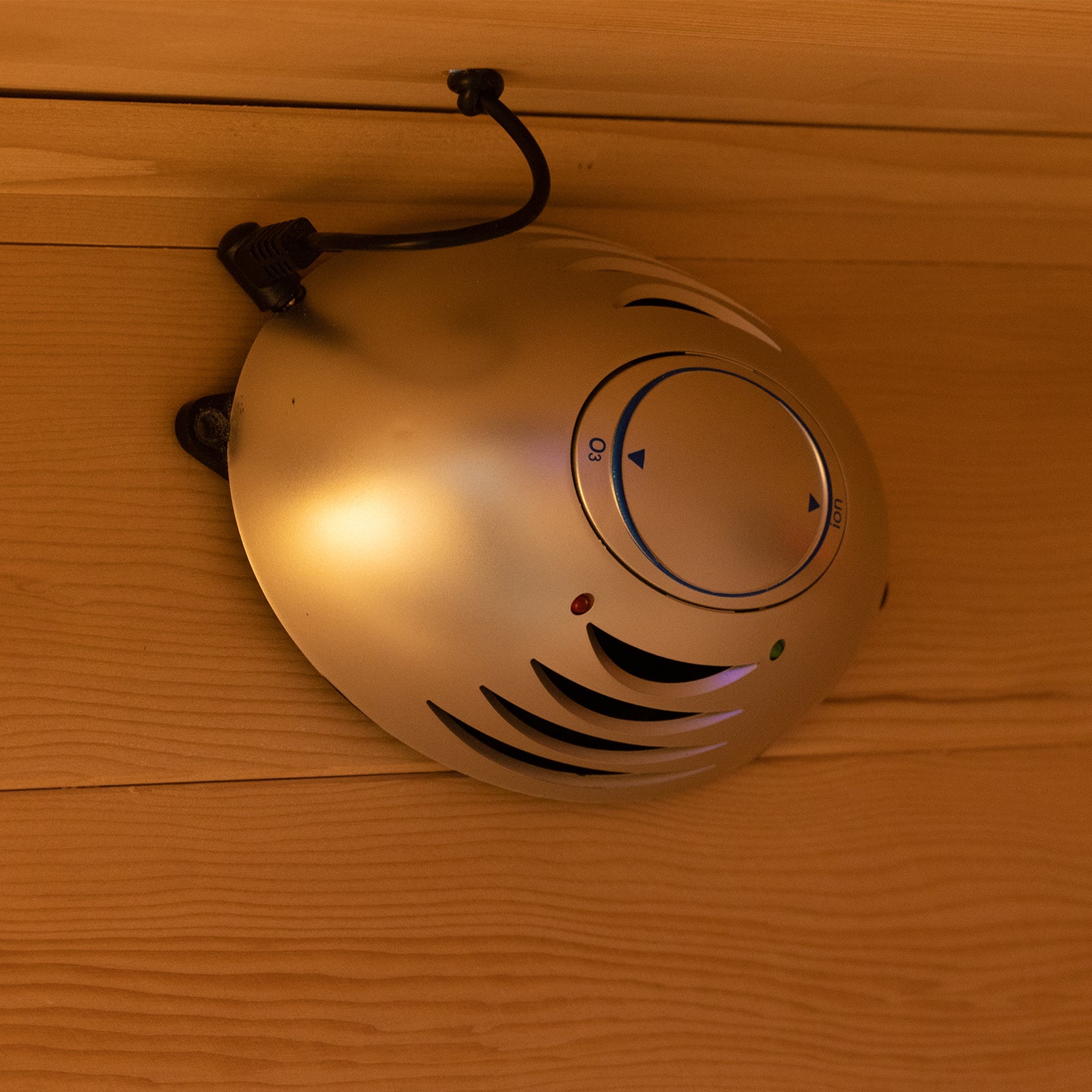 Harlow 2 Person Canadian Hemlock Infrared Home Sauna, wall-mounted with ozone/ion generator, adjustable dial, airflow vents, and LED indicators; designed for a relaxing wellness space at home.