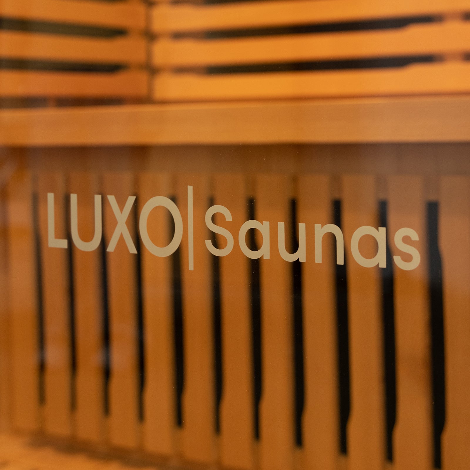 Tempered glass door of Luxo Living Harlow 3 Person Canadian Hemlock Infrared Home Sauna