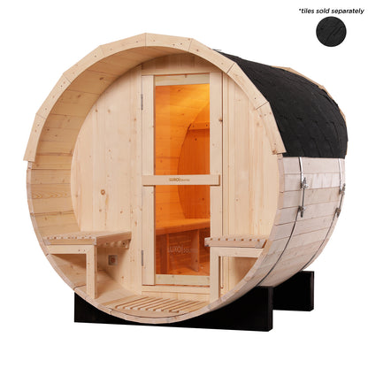 Luola 2 Person Pine Outdoor Barrel Sauna & Harvia Stove features a light timber barrel design with glass door, interior benches, exterior seating, black shingle roofing, and rests on black support beams.