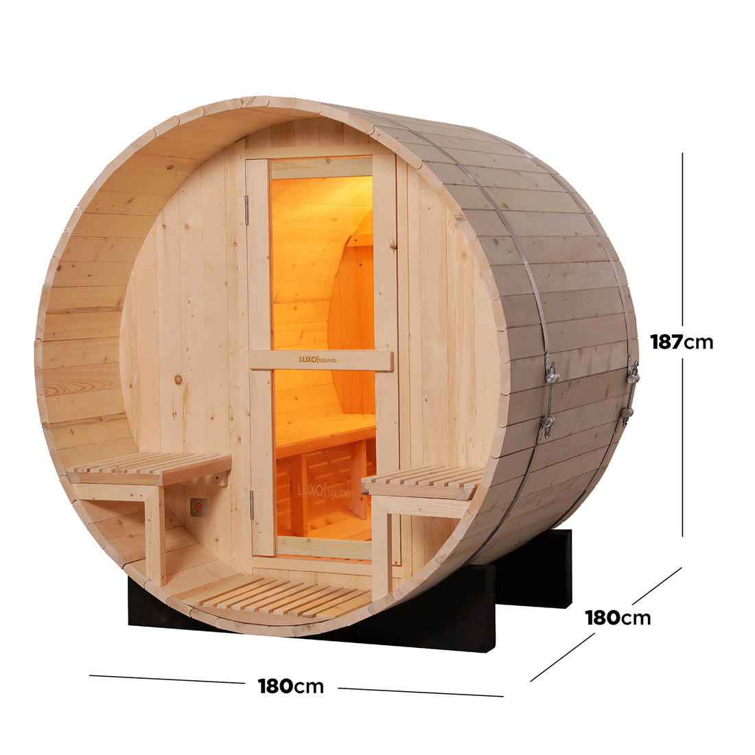 Luola 2 Person Pine Outdoor Barrel Sauna & Harvia Stove, featuring a freestanding timber structure with metal bands, glazed front door, bench platforms, and warm interior lighting, designed for backyard relaxation.