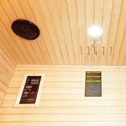 Taavi 2 Person Ceramic Infrared Indoor Home Sauna ceiling view showing a round speaker, recessed light with TEMP SENSOR, safety label, and LUXUSAUNA digital control panel with LED readouts and buttons.
