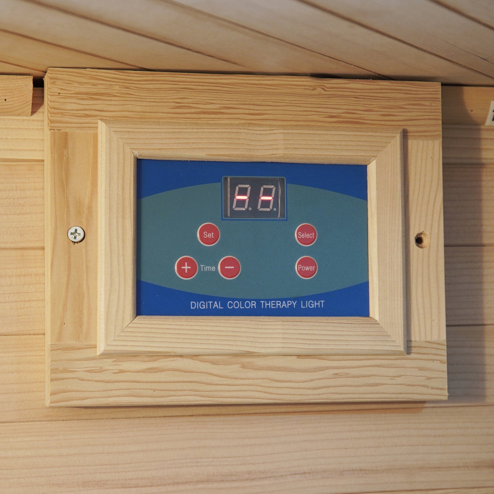 Wood-framed control panel for the Taavi 4-Person Corner Carbon Fibre Infrared Indoor Sauna, featuring a digital display and red buttons for managing the integrated color therapy light, enhancing relaxation sessions.