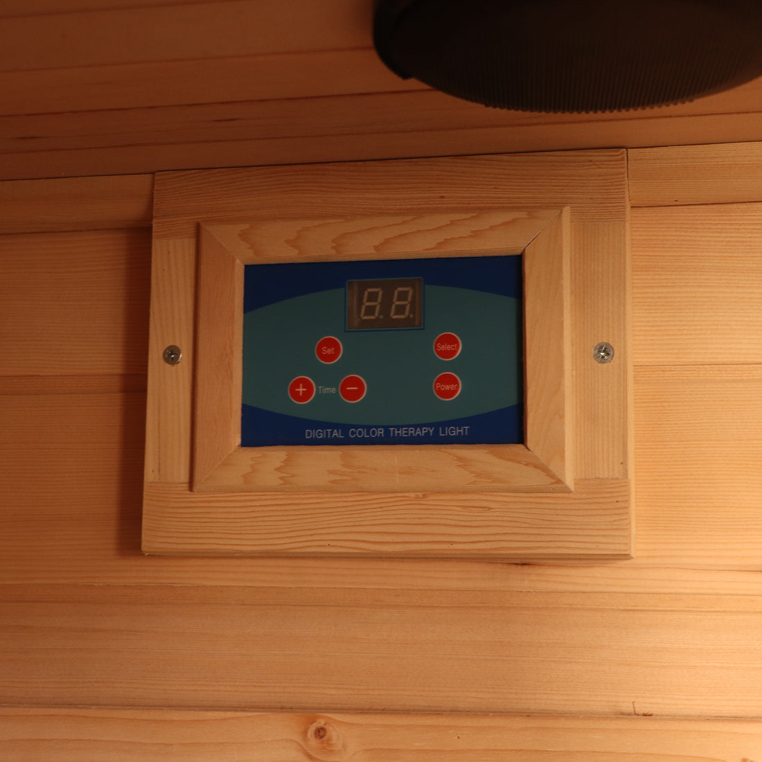 Close-up of the Valo 2-Person Canadian Hemlock Carbon Fibre Home Sauna Cabin showcasing a sleek wooden panel with a digital display, highlighting its elegant hardwood finish and modern features.