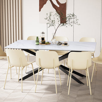 Alfred 180cm Modern Pedestal Dining Table - White Marble, featuring a sleek white marble-look top with angular black legs, surrounded by six cream dining chairs, set with a French press and wooden tray.