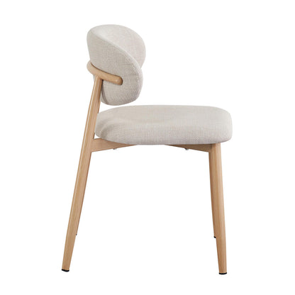 The Audrey Curved Fabric Dining Chair Set of 2 in Beige features armless design with light-wood frame, tapered legs, and neutral-beige textured upholstery on seat and back cushion for modern comfort.