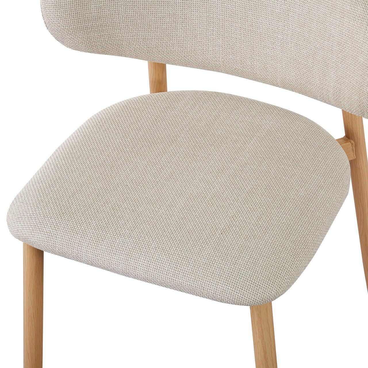 Close-up of the Audrey Curved Fabric Dining Chair Set of 2 in Beige, showcasing the light-beige upholstered seat and backrest with natural-wood legs, highlighting its modern design and plush comfort.