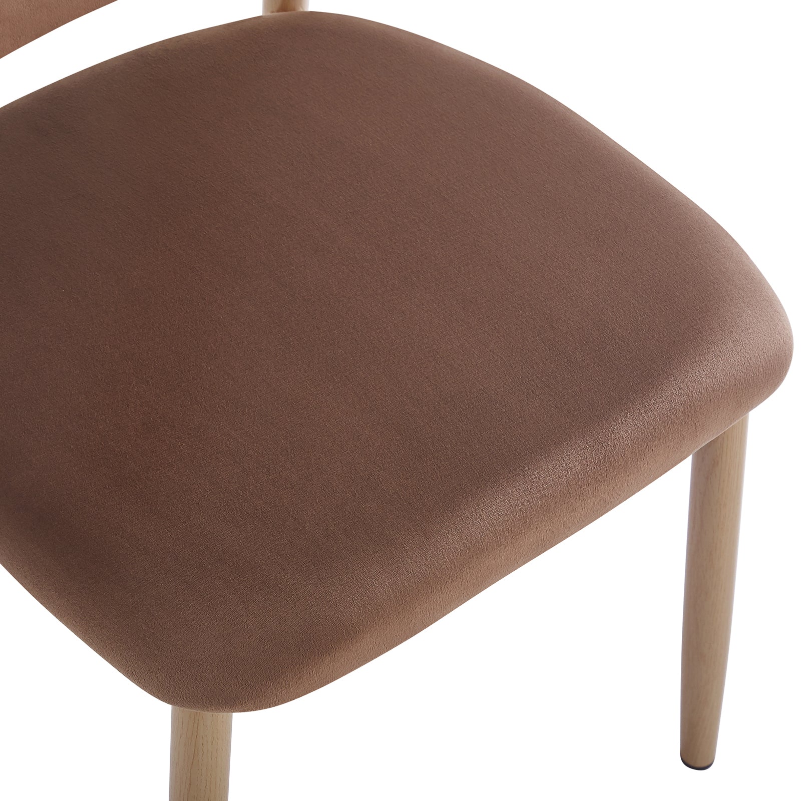 Close-up of the Audrey Fabric Dining Chair Mocha Mouses Set of 2, featuring a padded, brown upholstered seat with light wood-toned metal legs, showcasing its refined design and plush comfort.