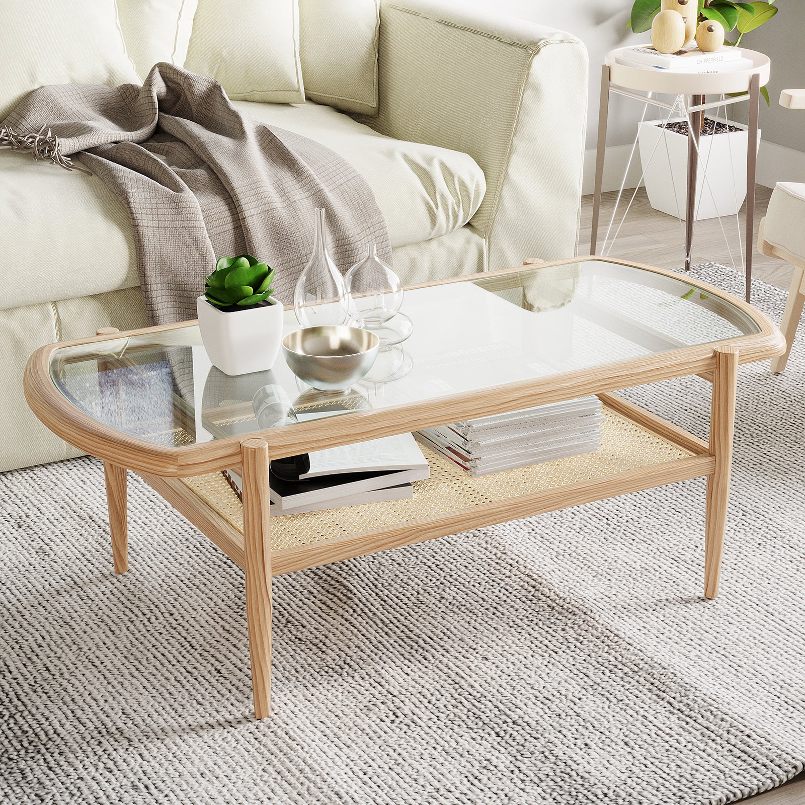 Ayesha Rattan American Oak Coffee Table with tempered-glass top and rattan shelf, showcasing a stylish rectangular design, situated in a living room setting with plant and fruit elements.
