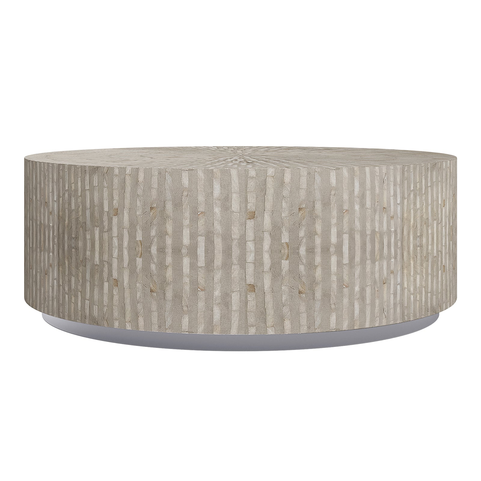 Baltoy 100cm Mother of Pearl Coffee Table in Striped Bone, showcasing a low, circular design with a neutral beige mosaic pattern and a floating appearance on a recessed plinth base.