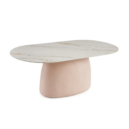 Oval coffee table with marble-patterned top and blush pink base on a white background