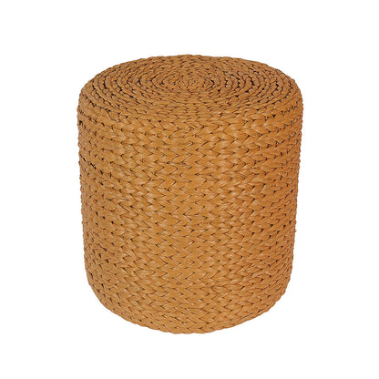 Carla 40cm Water Hyacinth Pouffe Ottoman - Honey, a small, cylindrical ottoman made of natural braided fibers, ideal for bohemian interiors, serving as a seat, footrest, or coffee table.