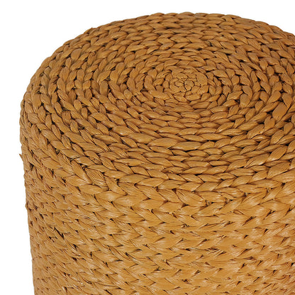 Close-up of Carla 40cm Water Hyacinth Pouffe Ottoman - Honey, showcasing its round, braided natural-fiber design with a spiral woven straw pattern across the top and sides.