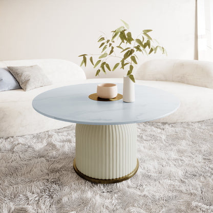 Combee 80cm Sintered Stone Coffee Table Cream White, showcasing a smooth top and microfiber leather base, positioned next to a plant on a table, emphasizing its versatile and elegant design.