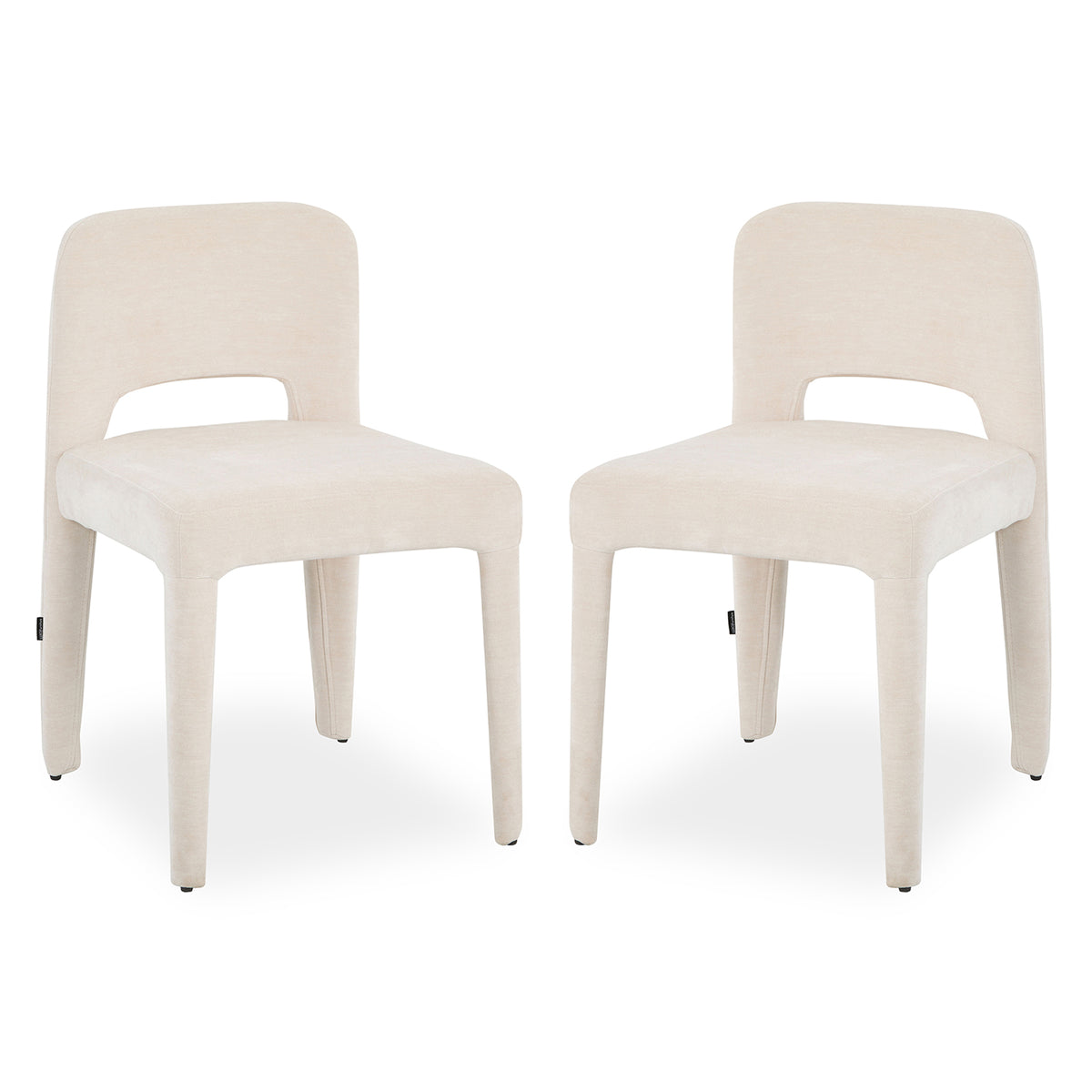 Two Edris upholstered dining chairs in oat fabric with curved backrest cutout and tapered legs