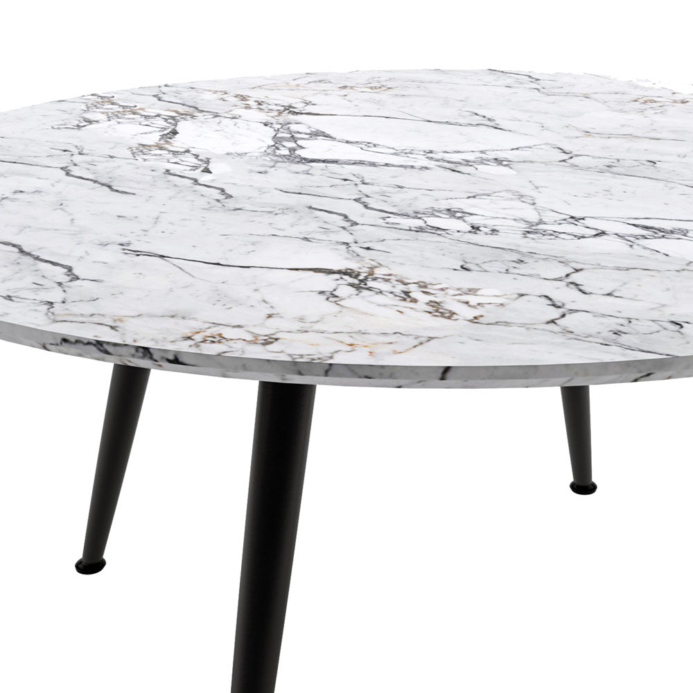 Eugene 120cm 4 Seater Round Dining Table in Marble, featuring a white marble-veined tabletop with sleek black metal legs, embodies modern elegance and functionality in any dining space.