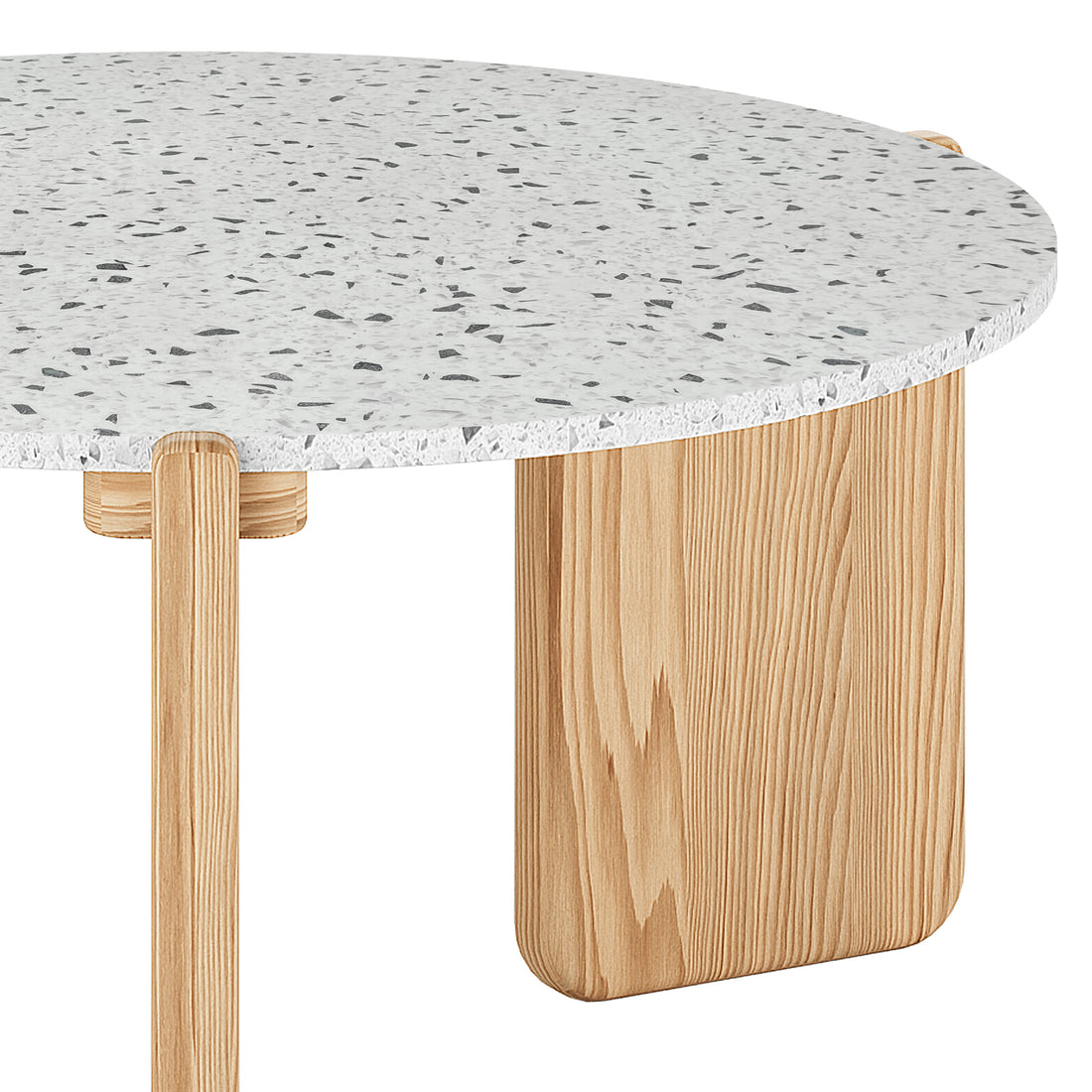 Close-up of the Everlee Hardwood American Oak Coffee Table in Natural, featuring a round, speckled terrazzo-style tabletop with light-wood legs: one cylindrical and one flat, rounded-corner panel.