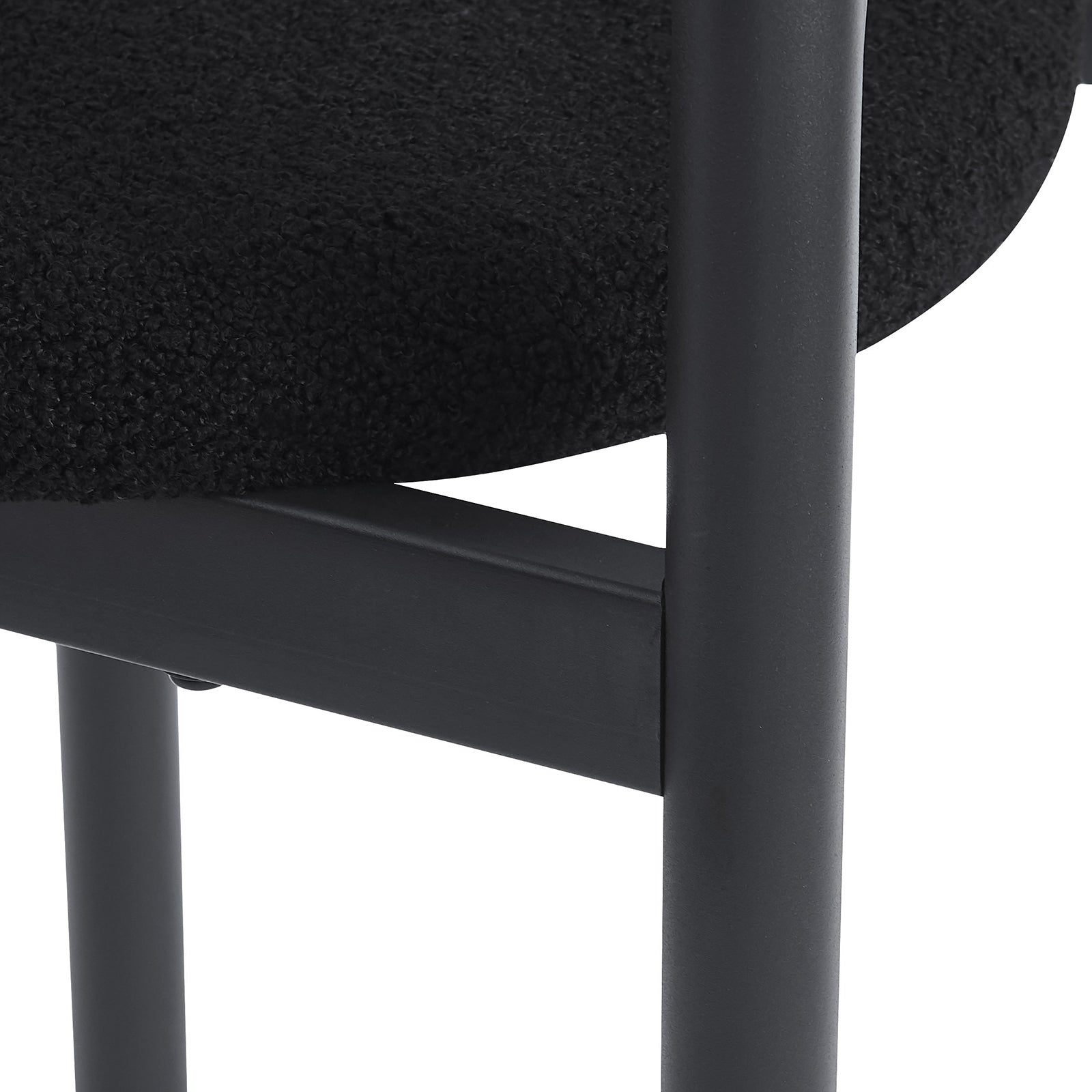 Gilles Boucle Arched Dining Chair Black Set of 2, featuring a sleek double-arched backrest and upholstered seats in luxurious boucle fabric, supported by a sturdy powder-coated metal frame.