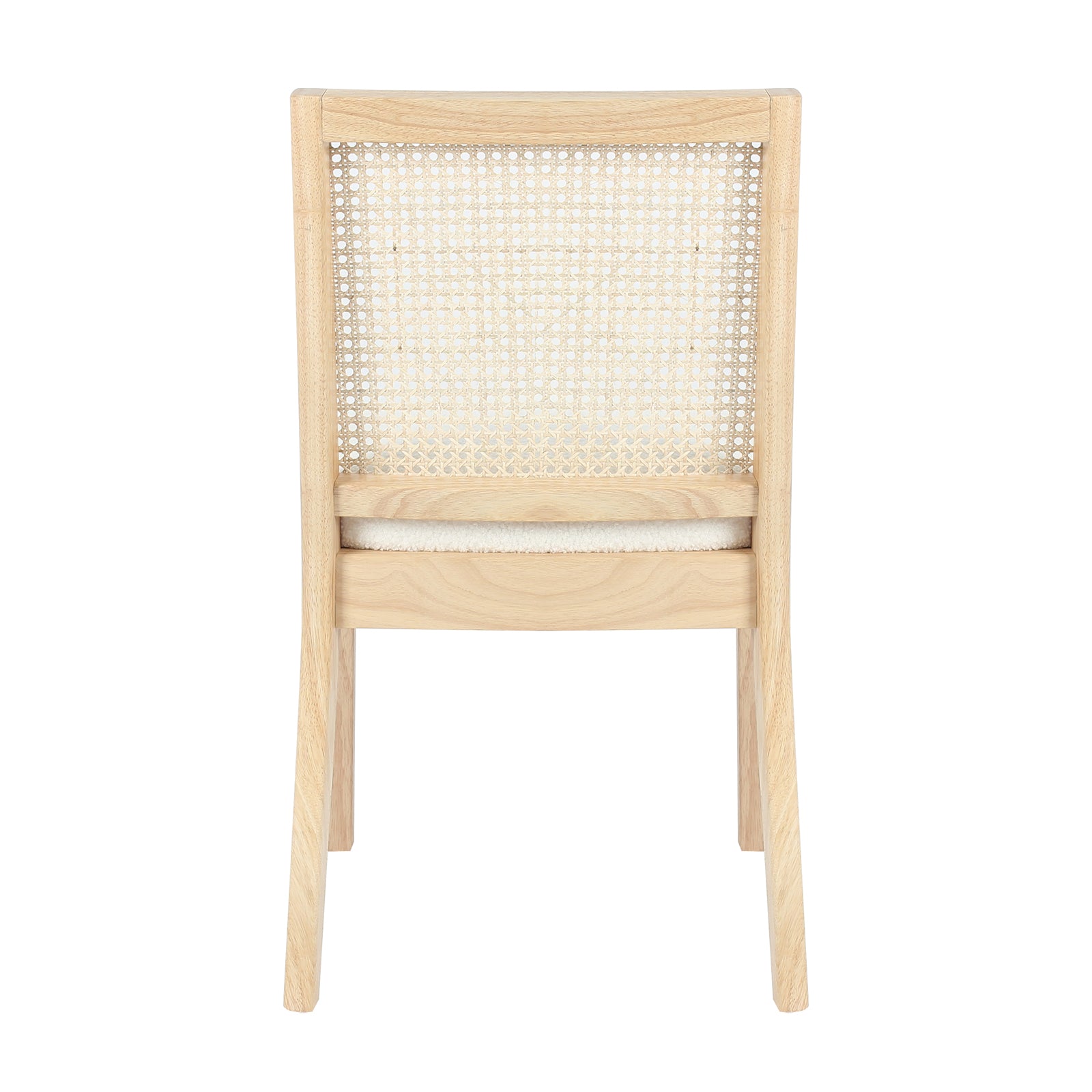 Rear view of Gretel Hardwood & Rattan Dining Chair Set of 2 in Natural, showcasing the woven cane backrest within a wooden frame, and the top edge of a lightly upholstered seat cushion.