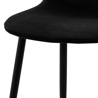 Close-up of the Halsa Velvet Fabric Classic Dining Chair Set of 4 - Black, featuring sleek black legs and plush velvet upholstery, emphasizing its elegant design and comfortable seating.