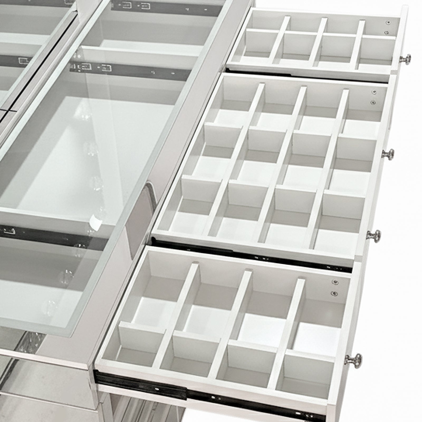 Ivy Diamond Crystal Mirror Finish Hollywood LED Vanity Table features a glass-topped compartment and three multi-drawer organizers, perfect for displaying and organizing jewelry or small parts.