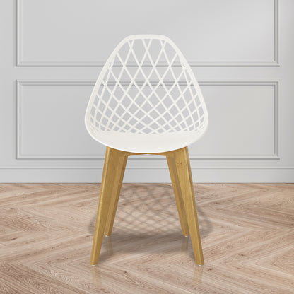 Jonah Beech Wood Dining Chair (Set of 4) - Cream White, featuring a sleek polypropylene seat, wooden legs, and ergonomic design, set elegantly in a room, showcasing its minimalistic and modern style.