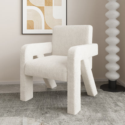 Julie Boucle Upholstered Accent Chair Cream White in a room, showcasing its soft boucle fabric and modern design. Positioned in front of a painting, highlighting its plush seat and sturdy engineered wood structure.