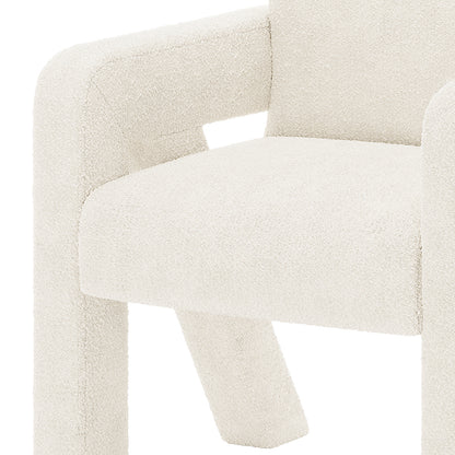 Julie Boucle Upholstered Accent Chair Cream White, featuring soft boucle fabric with thick sponge padding, showcases a modern design. The chair's engineered wood structure provides stability, perfect for various room settings.