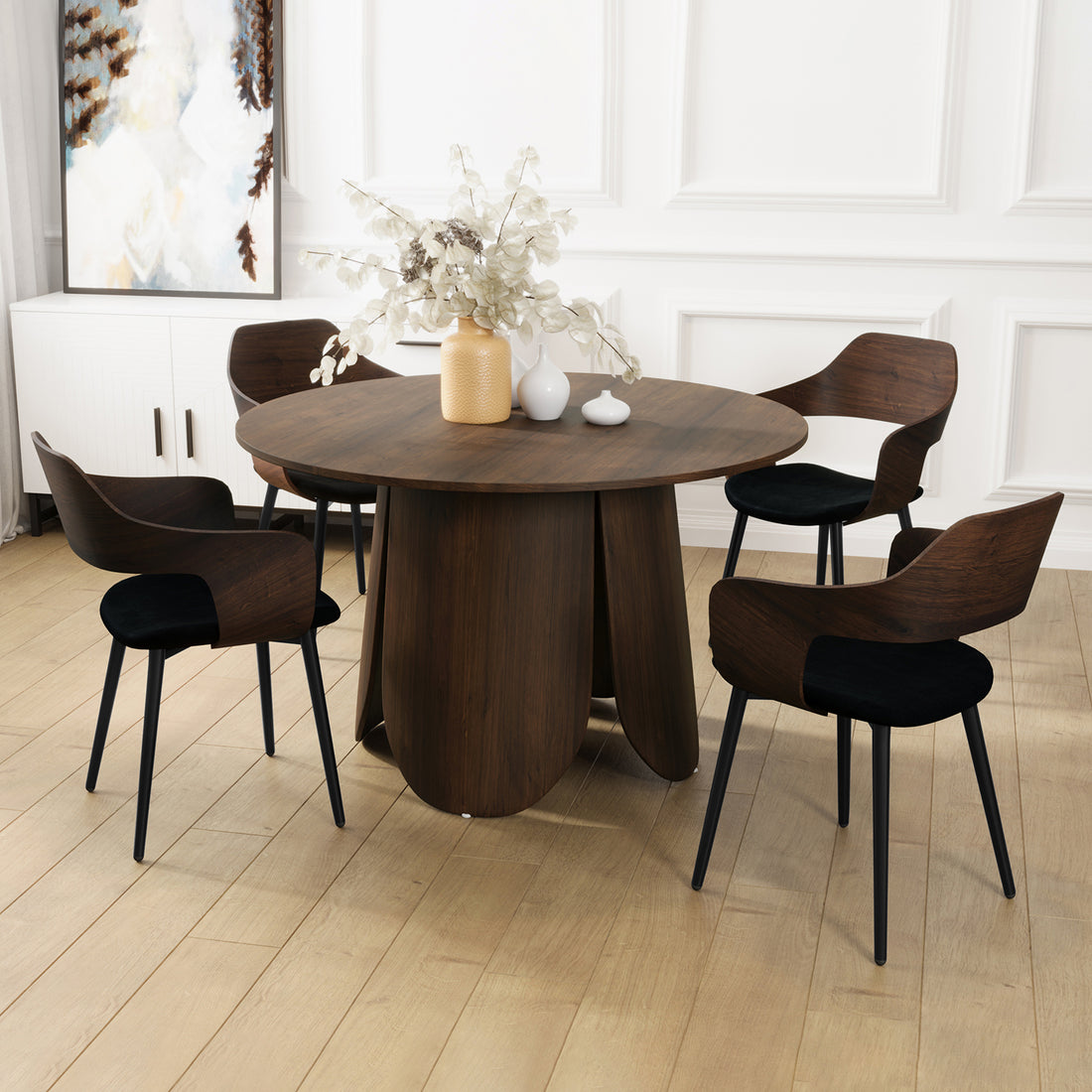 Kaylani & Winfield 5-Piece Wooden Dining Set with Velvet Chairs Walnut shown with a round wooden table and velvet chairs on a smooth floor, highlighting modern elegance and inviting design.