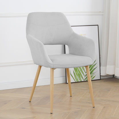 Light grey Keith Fabric Dining Chair Set of 2, featuring a modern upholstered design with a curved backrest, integrated armrests, and four tapered natural-wood legs against a white paneled wall.