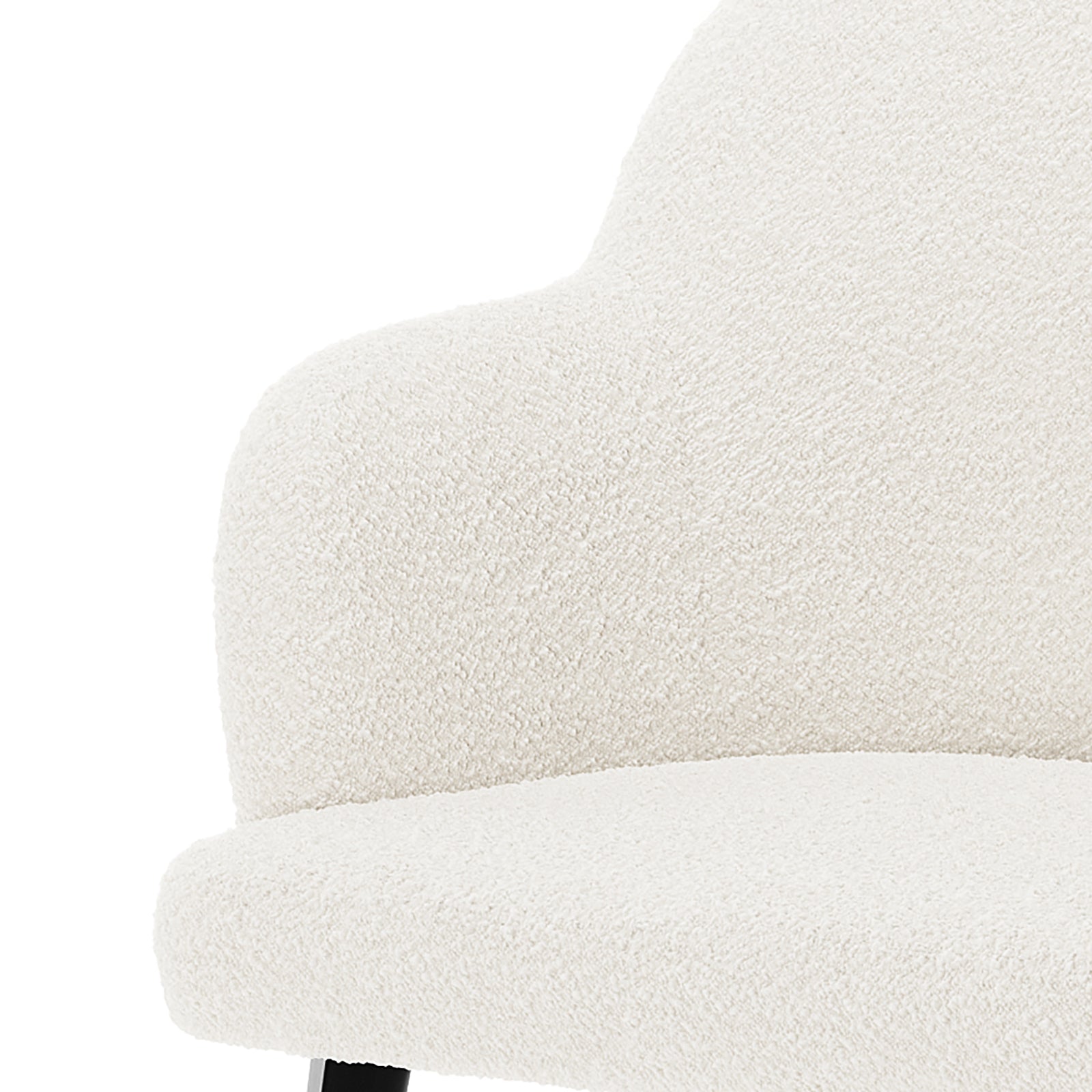 Close-up of the Lennon Bouclé Dining Chair Set of 2 in Cream White, showcasing its textured off-white bouclé upholstery and one visible black leg, highlighting modern elegance and comfort.