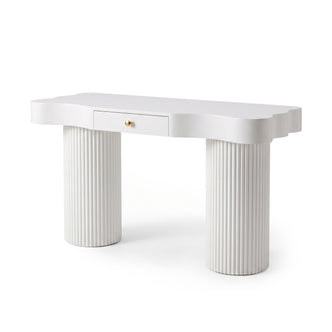 Stylish white console or vanity table with wavy edges, central drawer, and fluted column legs on a white background